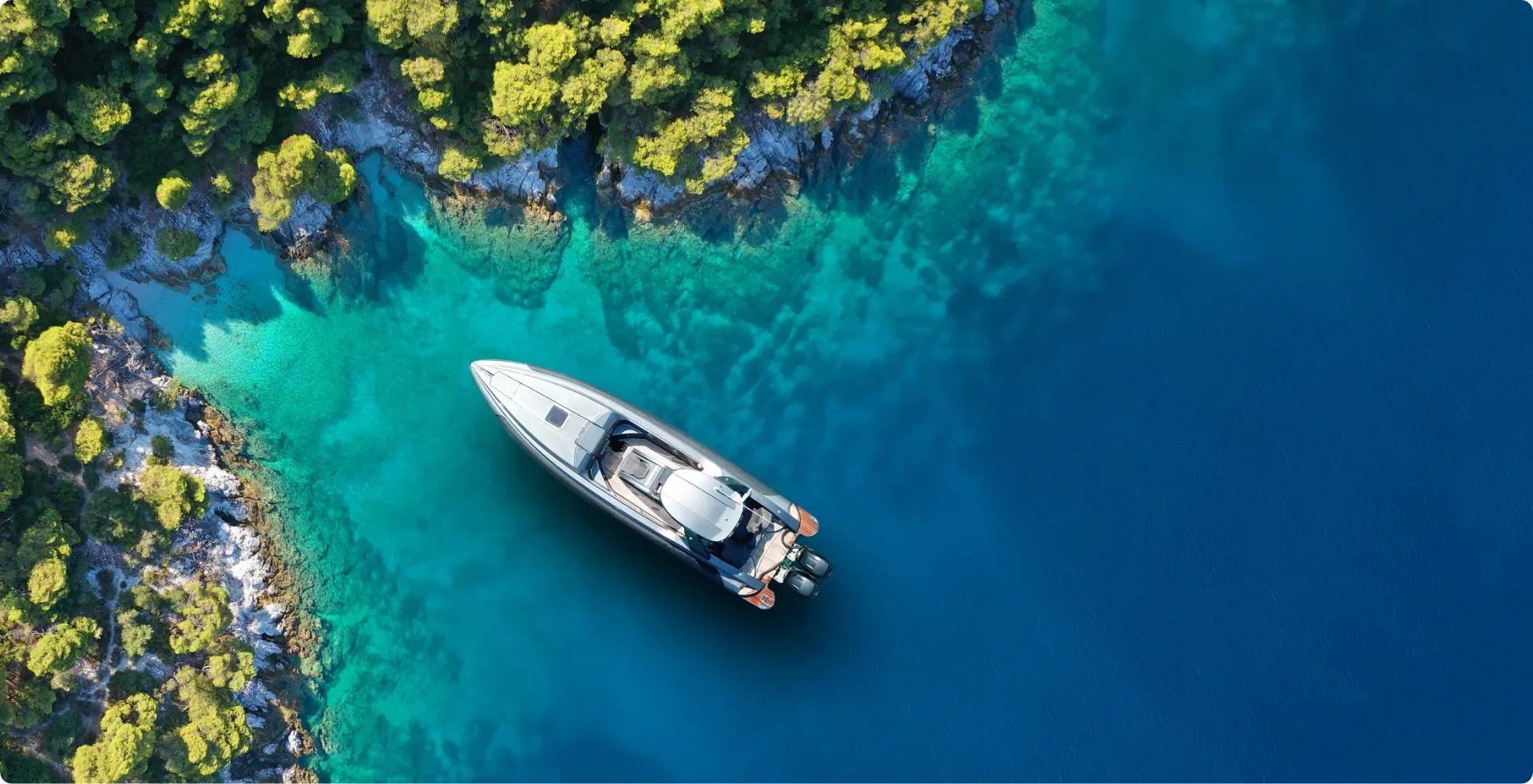 aerial view of a boat with Seakeeper stabilizer on calm blue water near Key Largo, FL