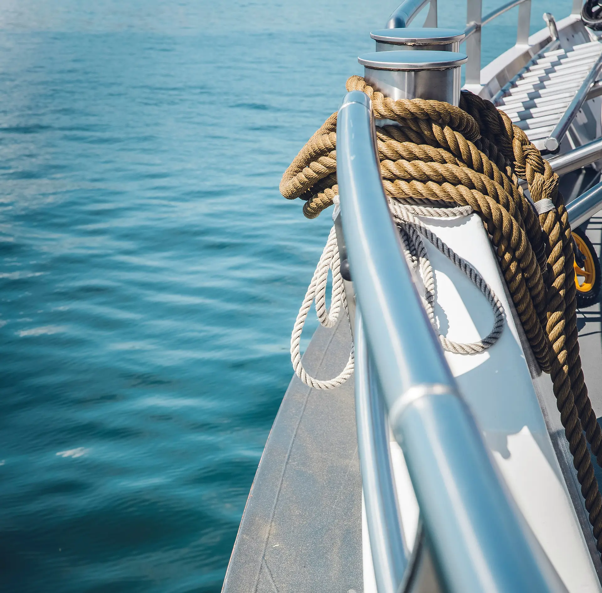 rope wrapped around metal railings on a boat with yacht stabilizers in Dania Beach